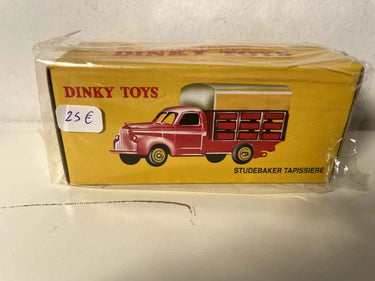 Camion Studebaker Tapissière rouge et bâche jaune Dinky-Toys (éditions Atlas) Bernard Miniatures