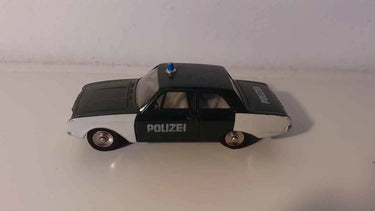 Ford Taunus verte foncée et blanche police italienne Dinky-Toys (Editions Atlas) Bernard Miniatures