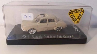 Renault Dauphine avec toit ouvrant de couleur beige foncé/marron clair? (avec boite en carton) Solido référence 4542 Bernard Miniatures