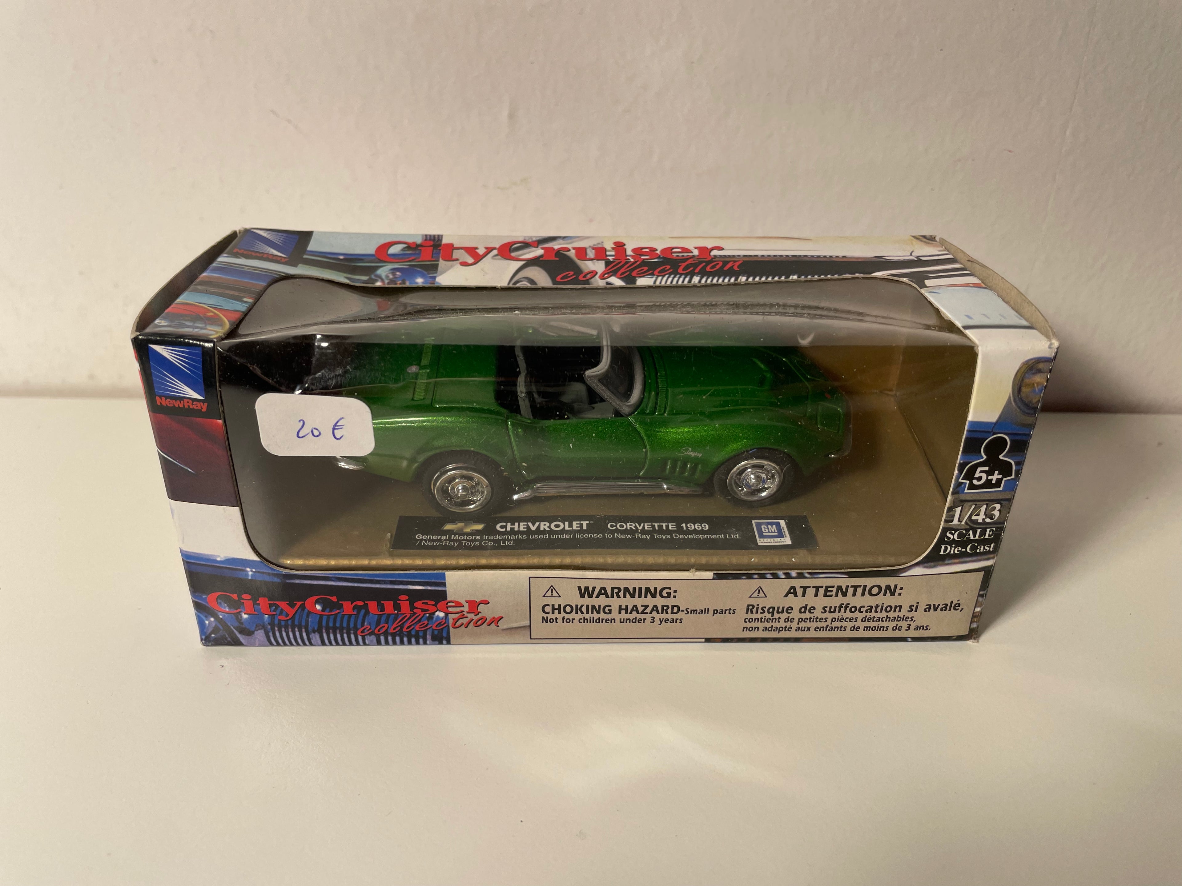 Chevrolet Corvette gréng aus 1969 - CityCruiser (amerikanescht Auto)