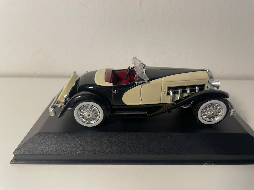 Duesenberg SSJ negra y beige de 1933 (automóvil americano)
