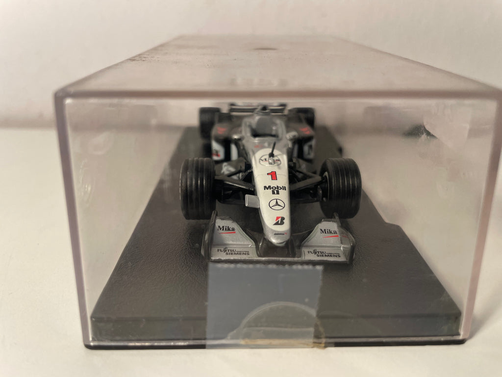 McLaren Mercedes MP4/14 noire, grise et blanche numéro 1 de 1999 - Formule 1