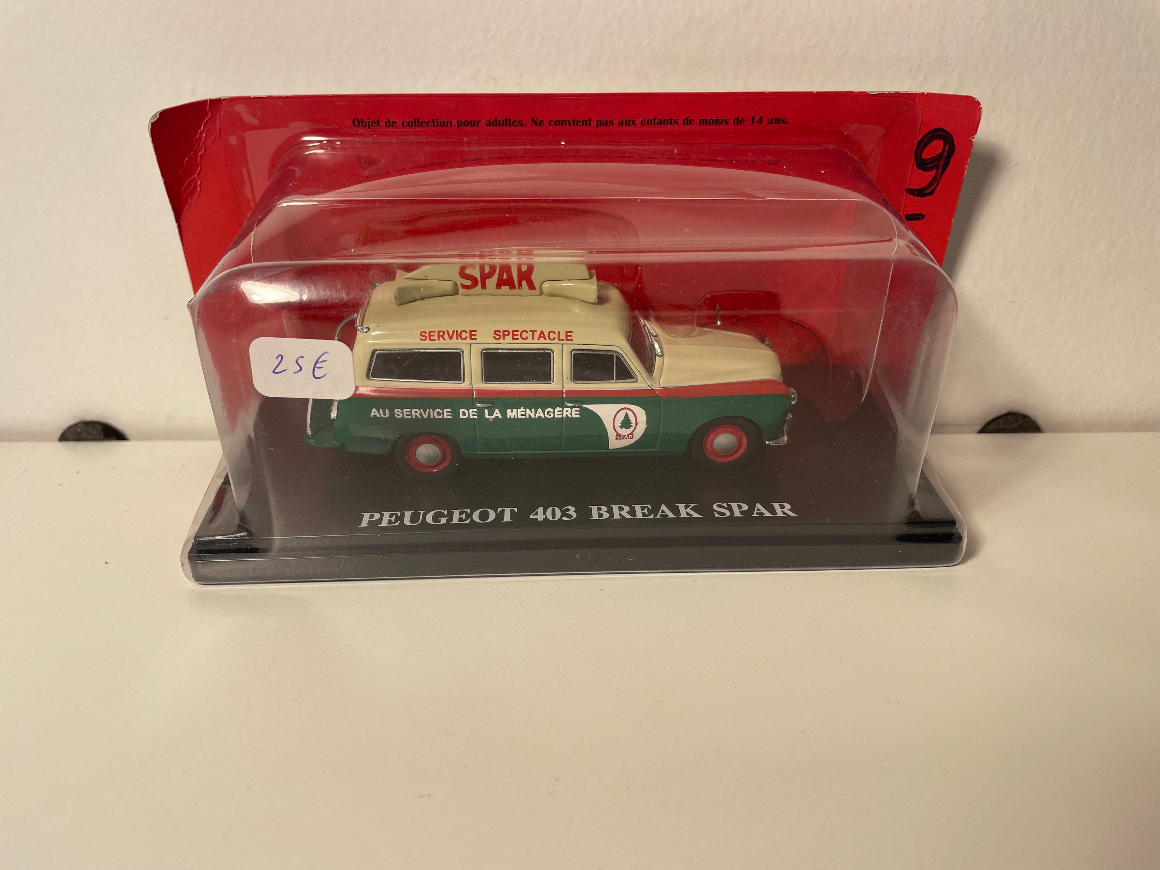Peugeot 403 green and beige break with SPAR advertising - promotional vehicle of the Tour de France