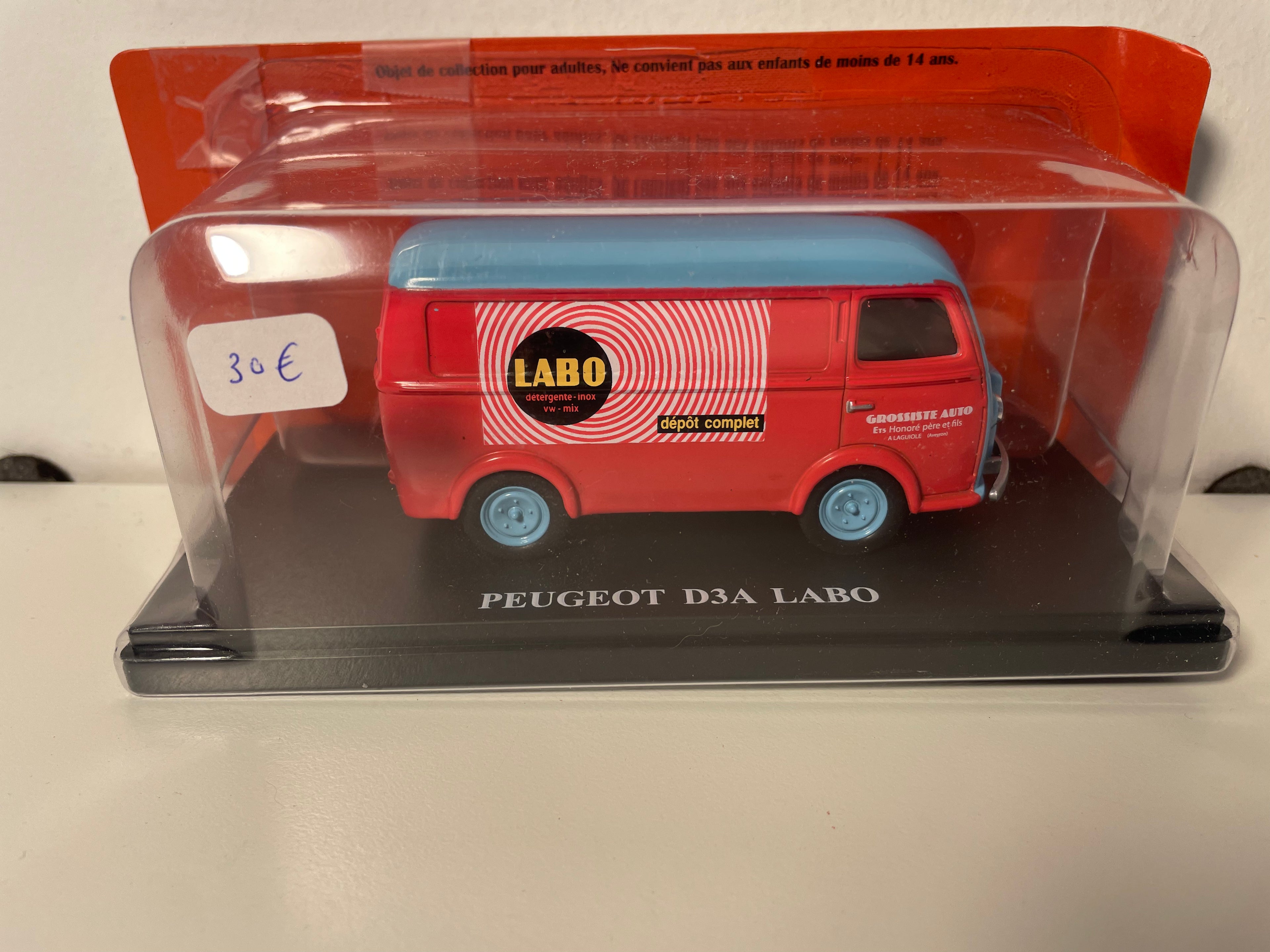 Peugeot D3A pinkish-red and blue with LABO oils advertisement