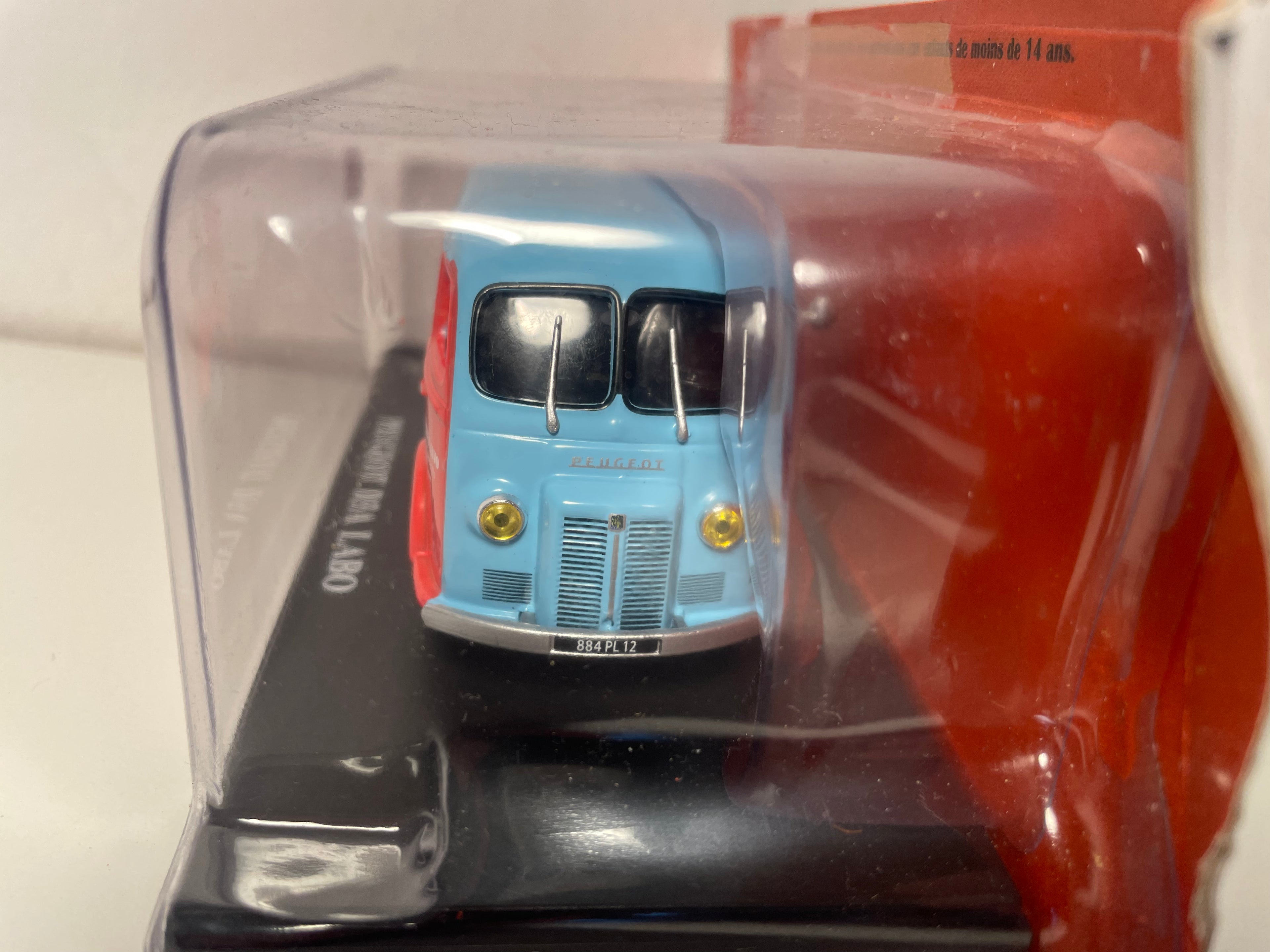 Peugeot D3A pinkish-red and blue with LABO oils advertisement