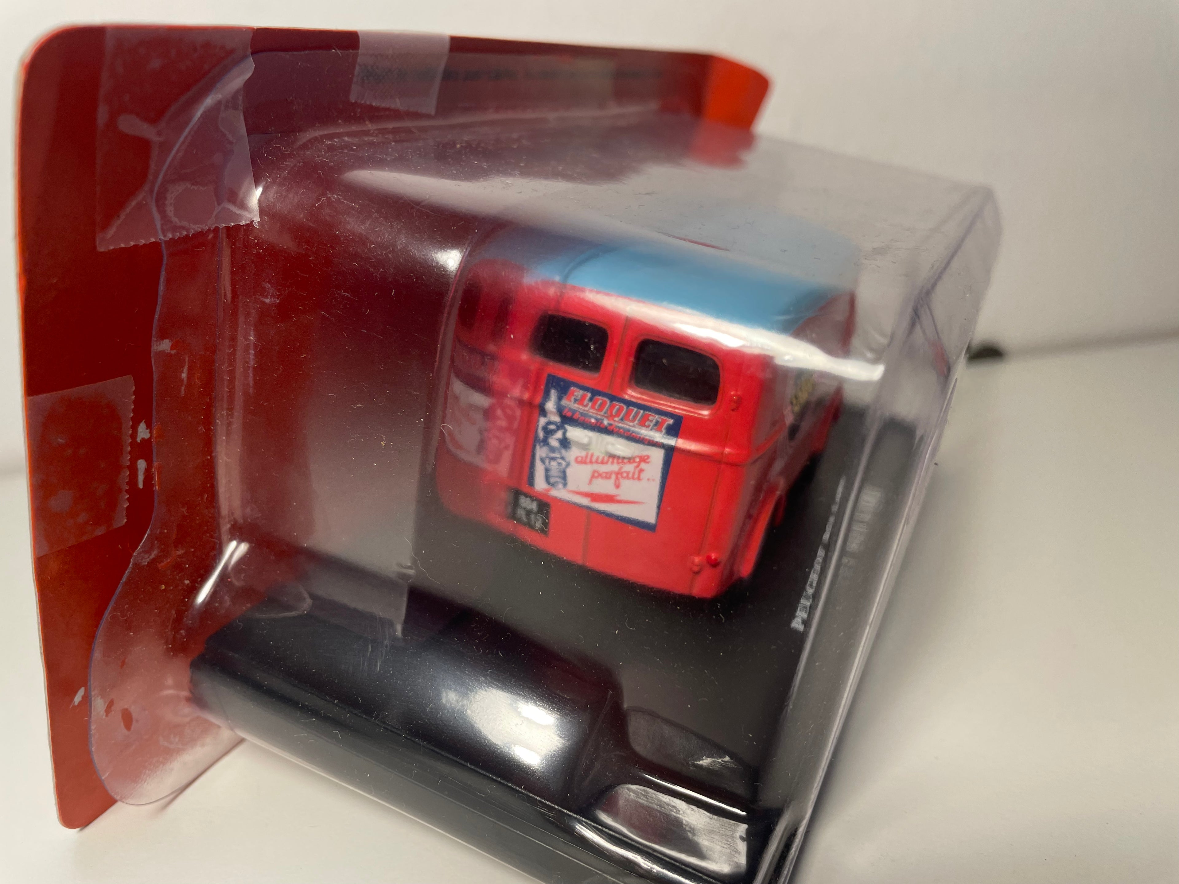 Peugeot D3A pinkish-red and blue with LABO oils advertisement