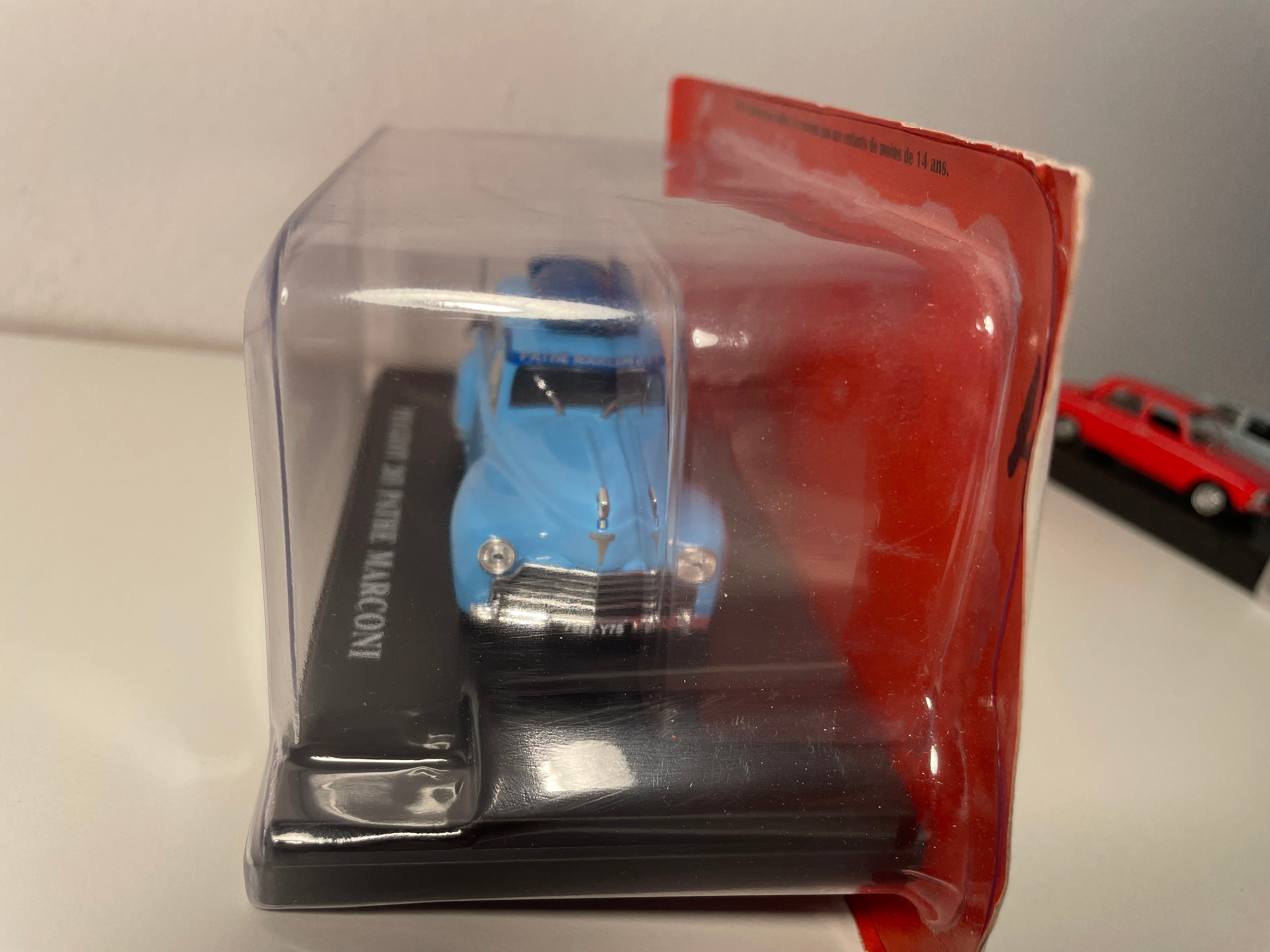 Peugeot 203 station wagon blue with Pathé Marconi radio advertisement