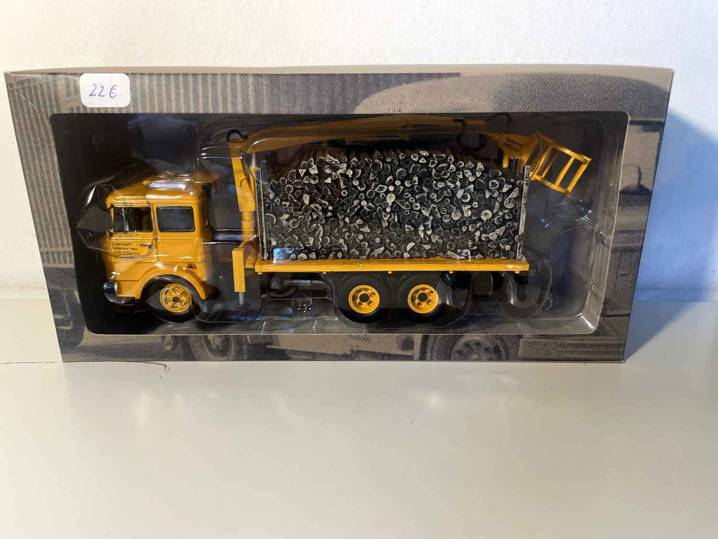 Yellow FIAT 190H truck transporting timber