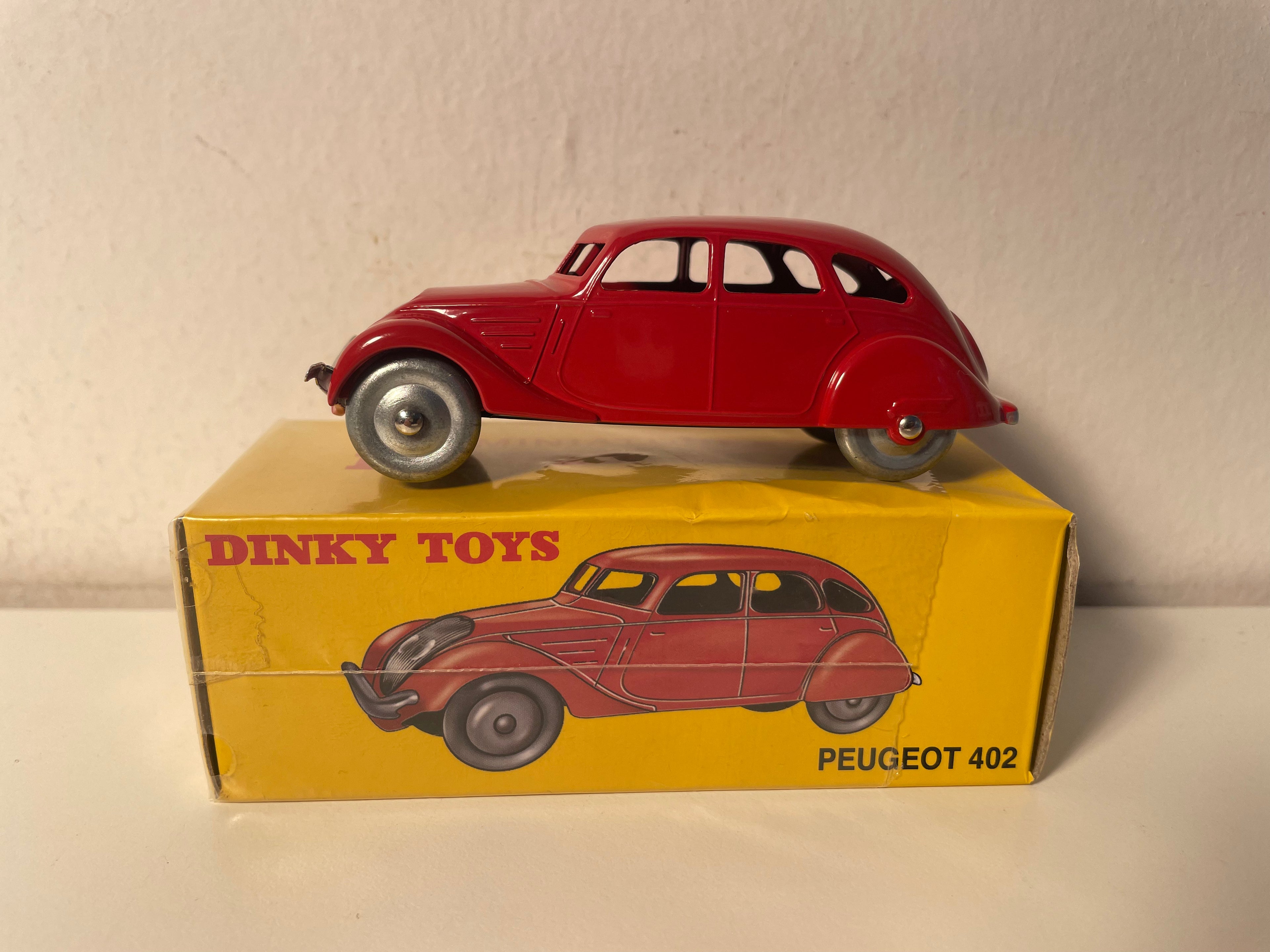 Peugeot 402 rouge foncée - Dinky-Toys (Editions Atlas) - N°24K