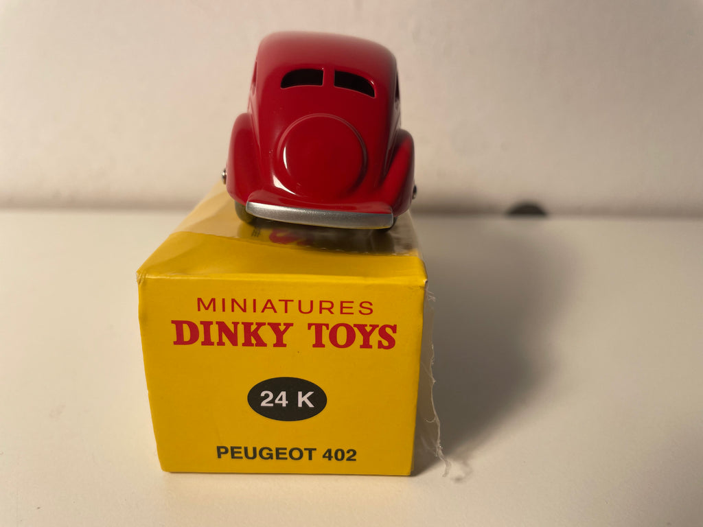 Peugeot 402 rouge foncée - Dinky-Toys (Editions Atlas) - N°24K