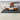 Wäissen an orange Renault 4 vun 1968 (Glaceverkeefer)