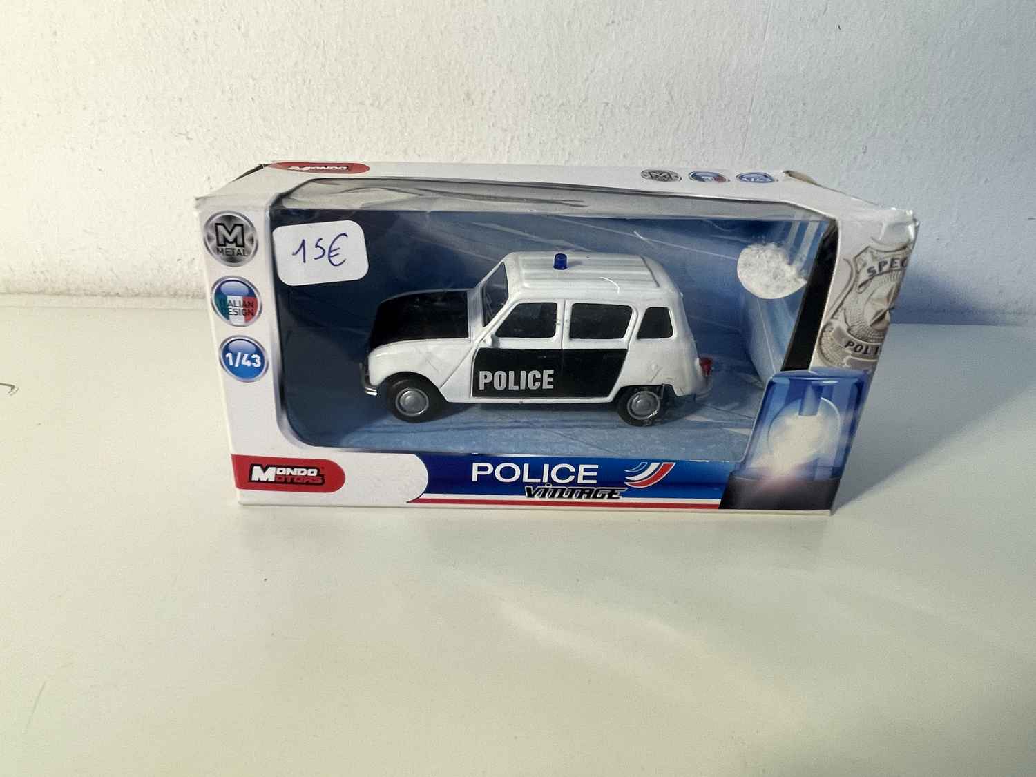 Renault 4L biała i czarna POLICJA - Mondo Motors