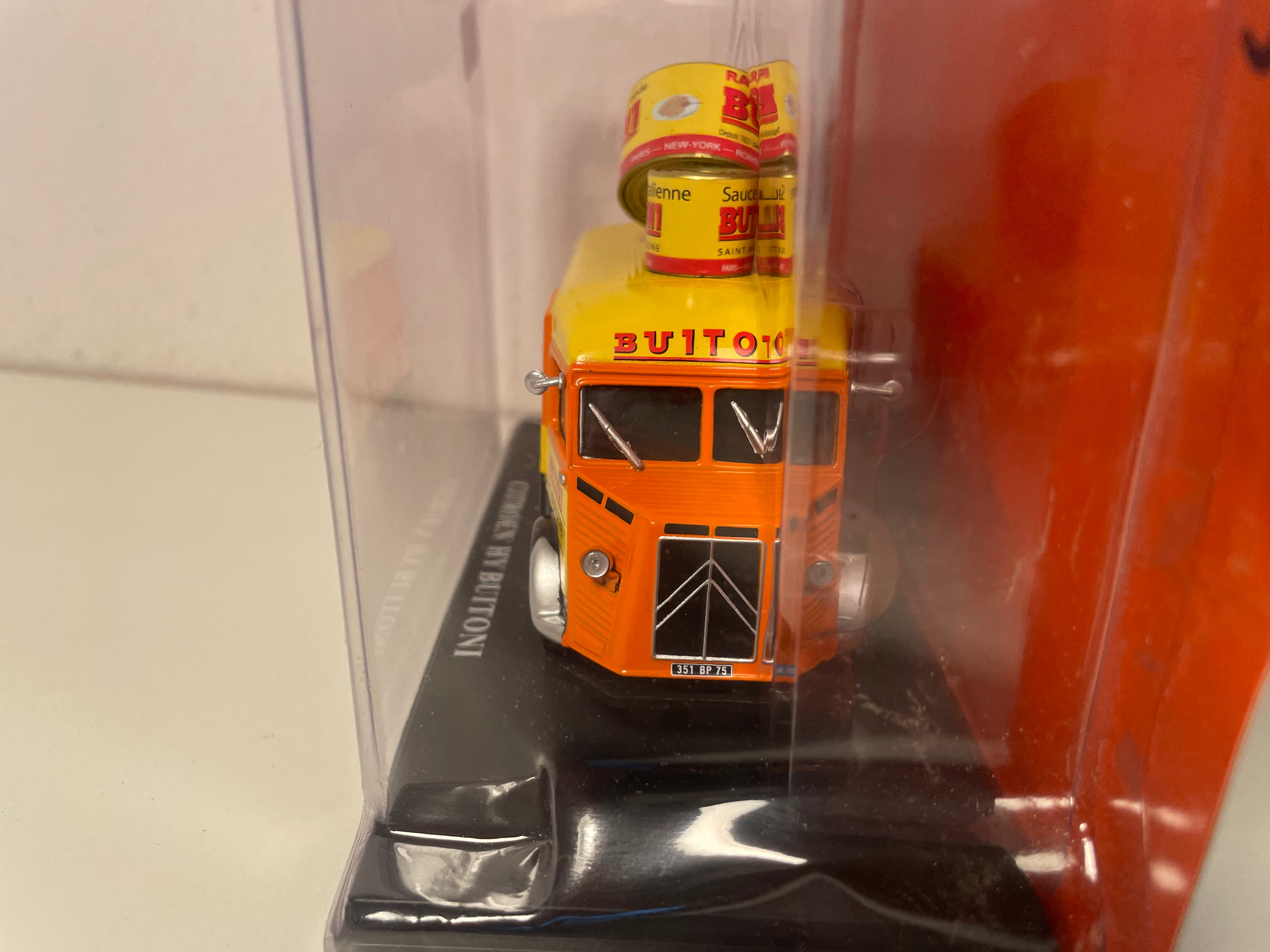 Citroën HY black, yellow, and orange with BUITONI advertising