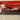 Peugeot 404 cabriolet blanche et rouge avec publicité VITTEL