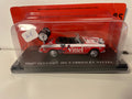 Peugeot 404 cabriolet blanche et rouge avec publicité VITTEL