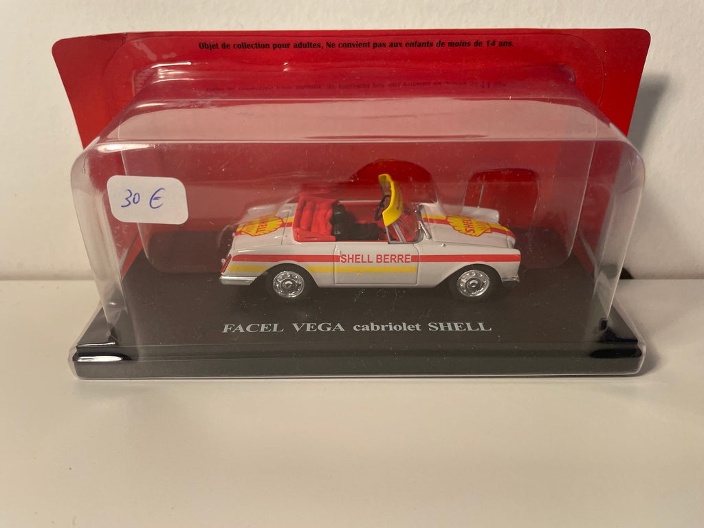 Facel Véga cabriolet cinza com listras amarelas e vermelhas com publicidade SHELL