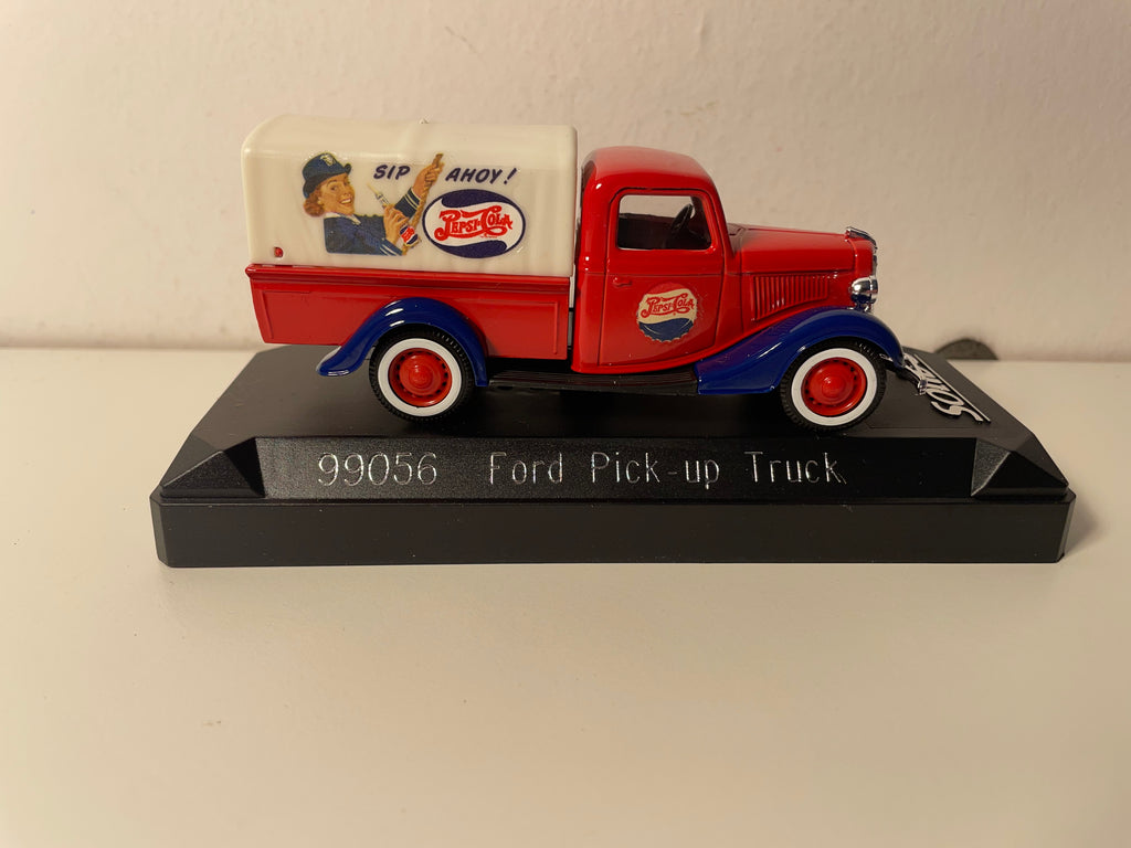 Ford Pick-up Truck in Red and Blue with Off-White Tarpaulin Featuring PEPSI-COLA Advertising - Solido Reference 99056 (with cardboard box)