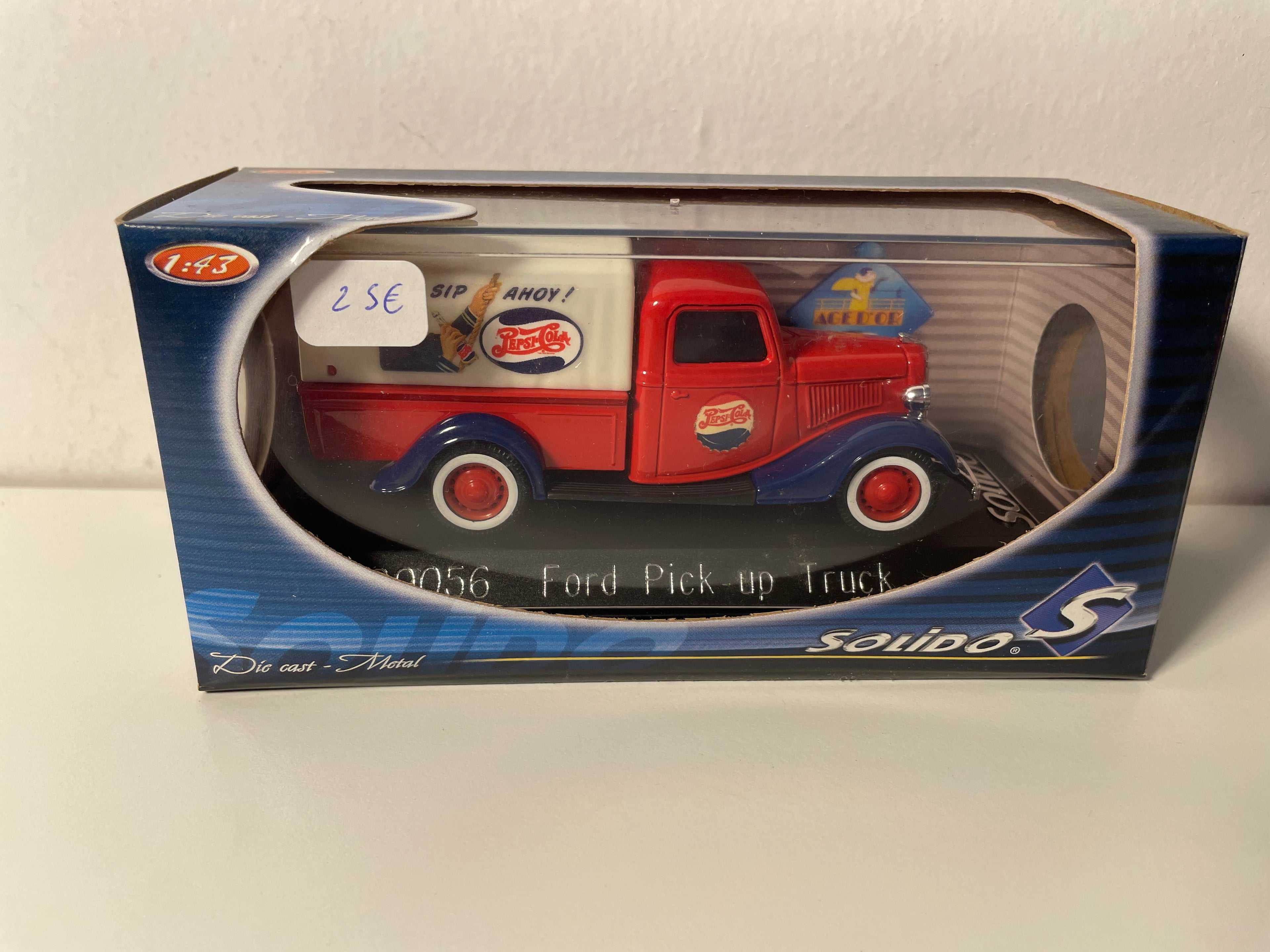 Ford Pick-up Truck in Red and Blue with Off-White Tarpaulin Featuring PEPSI-COLA Advertising - Solido Reference 99056 (with cardboard box)