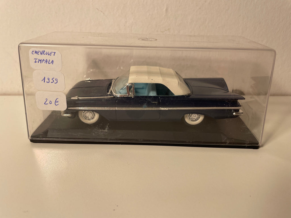 Chevrolet Impala azul y techo blanco de 1959 - Eligor