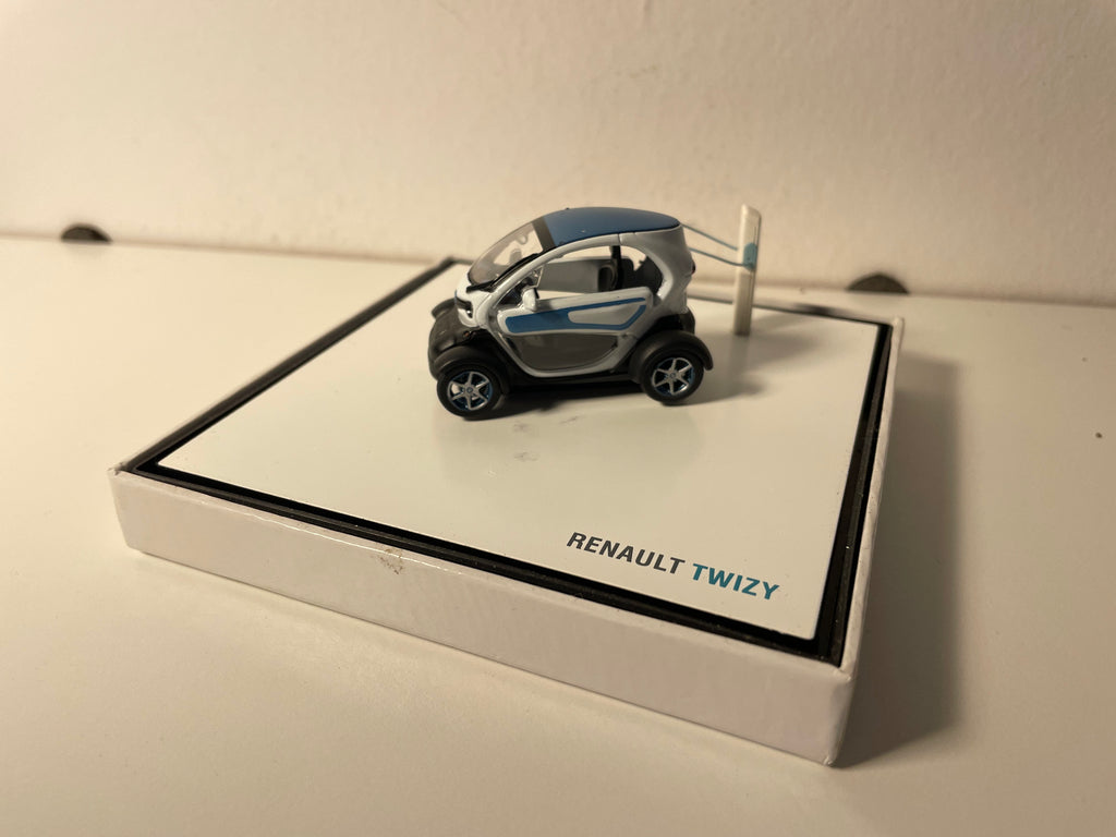 Renault Twizy blo a wäiss (elektronescht Gefier) - Këscht Box