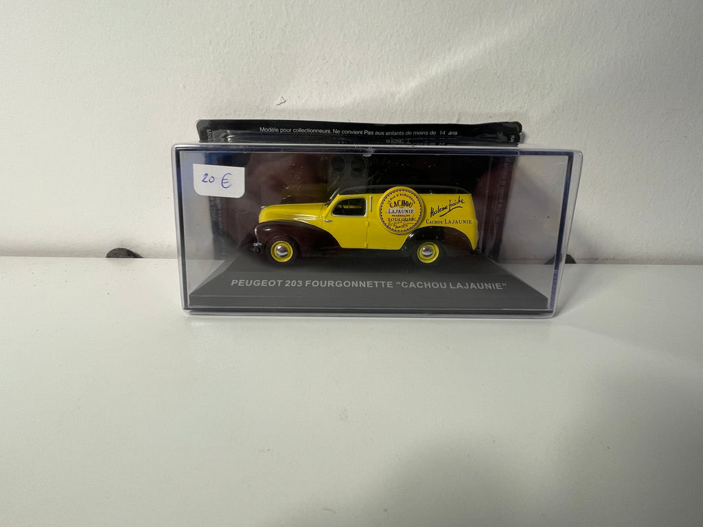 Furgoneta Peugeot 203 amarilla y negra - Publicidad 'CACHOU LAJAUNIE'