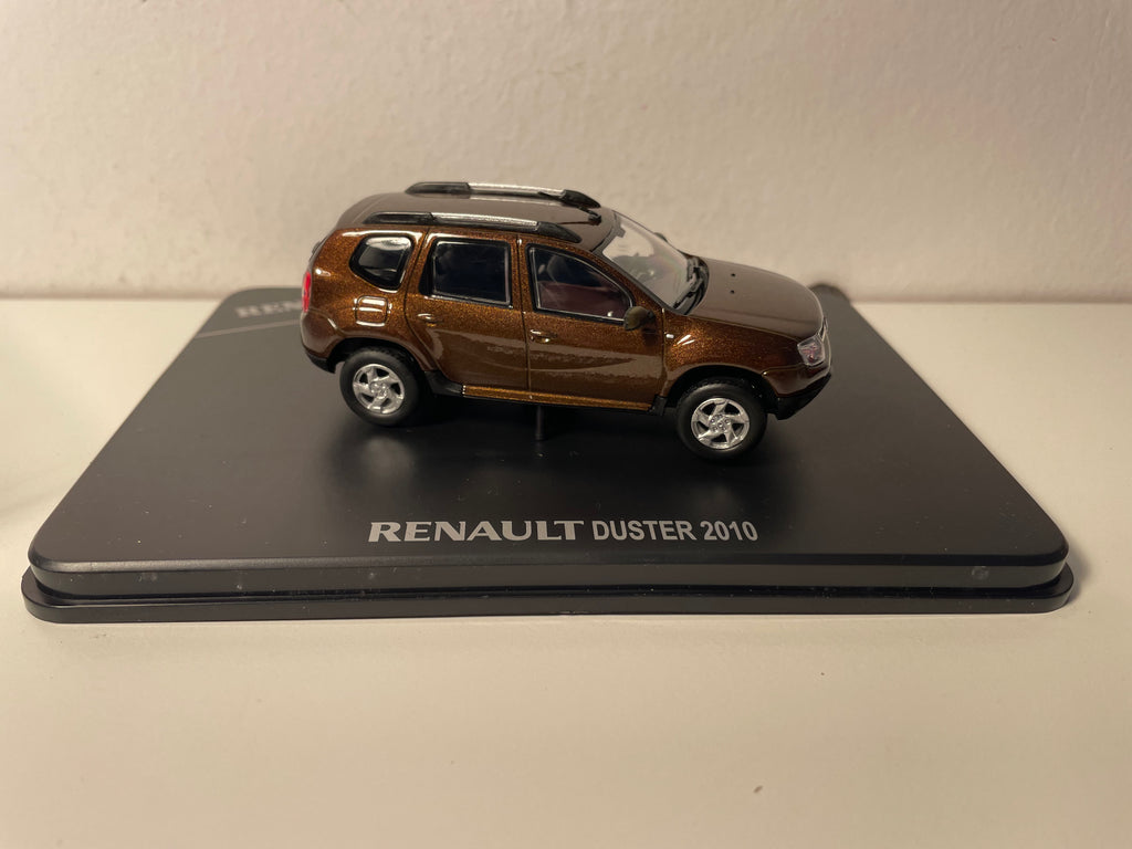 Renault Duster brązowy z 2010 roku - SOLIDO - zestaw w prostokątnej pudełku (pudełko nr 19)