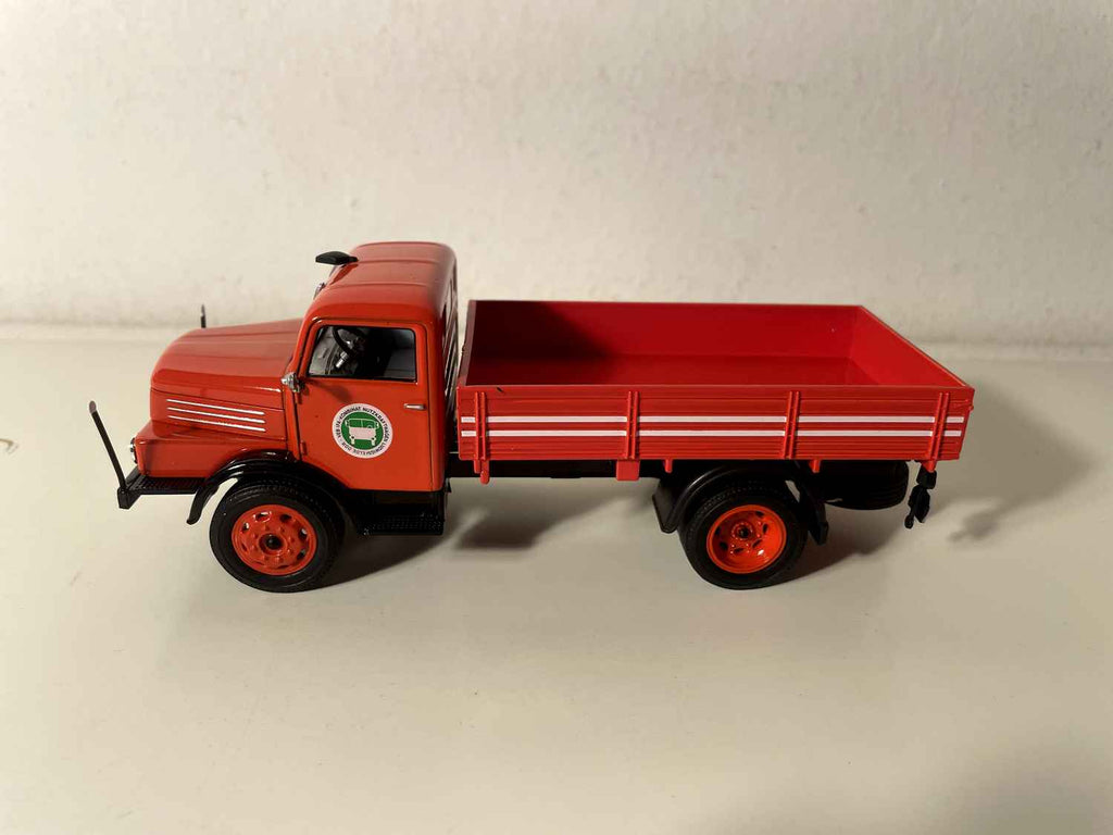 HORCH H3A red flatbed truck with green and white round logo on the door