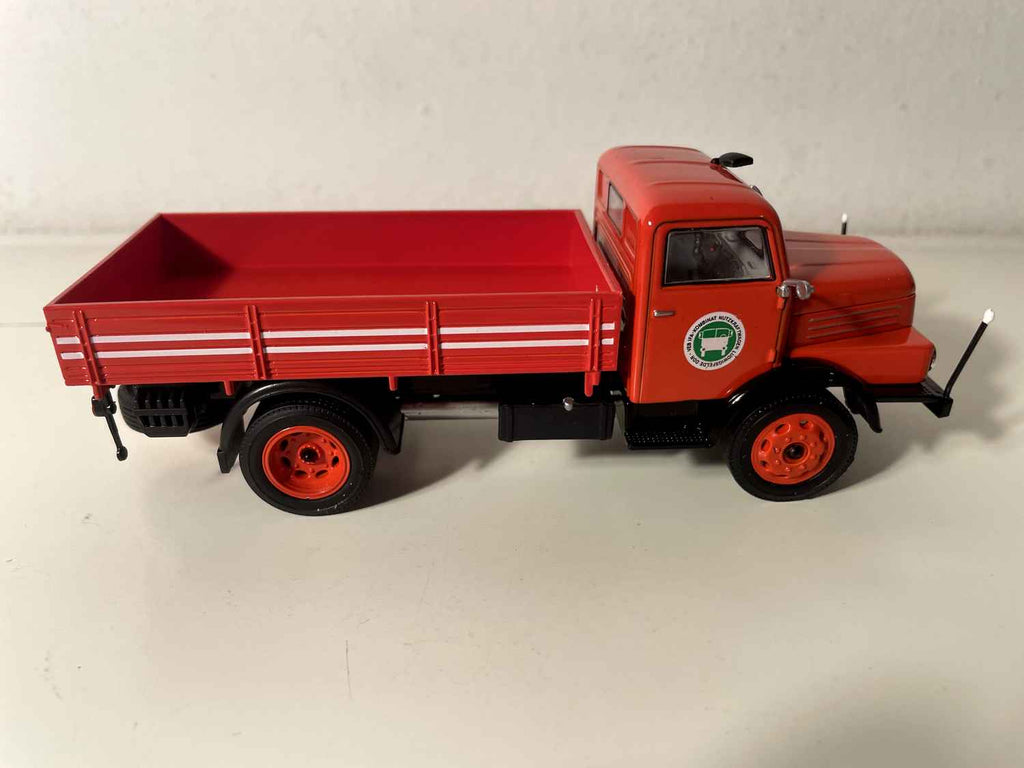HORCH H3A red flatbed truck with green and white round logo on the door
