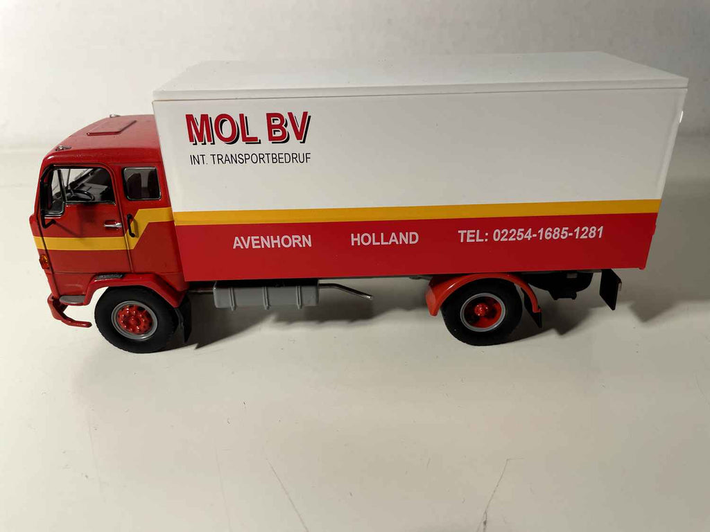 Orange and White Volvo F88 Truck MOL BV