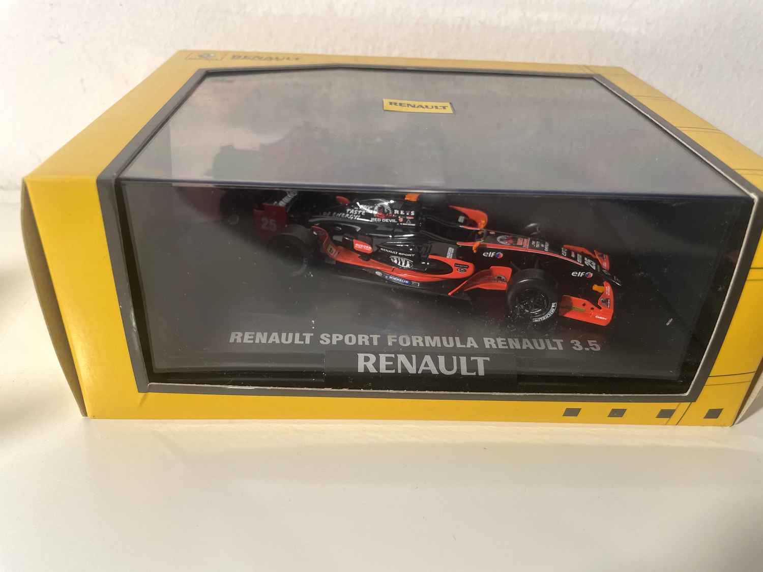 Renault Sport Formula Renault 3.5 pomarańczowo-czarny numer 25 - Norev
