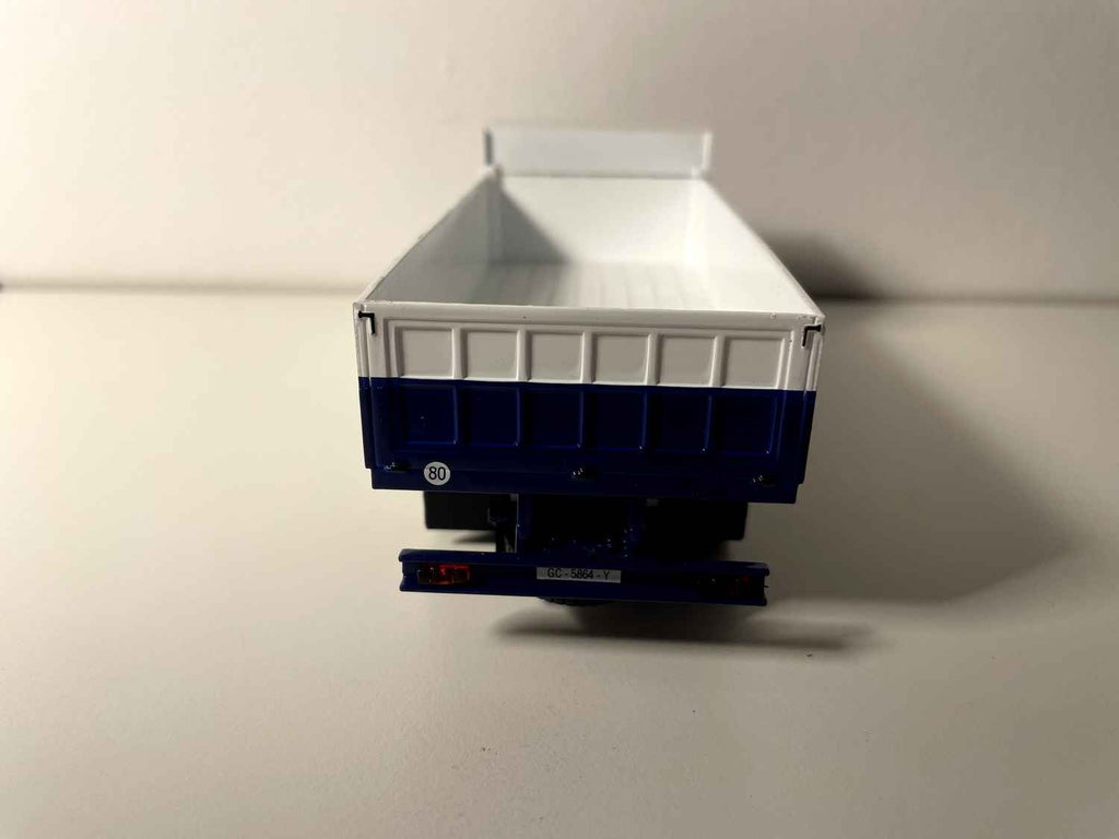 FIAT IVECO 619 truck with white cab and blue and white dump body