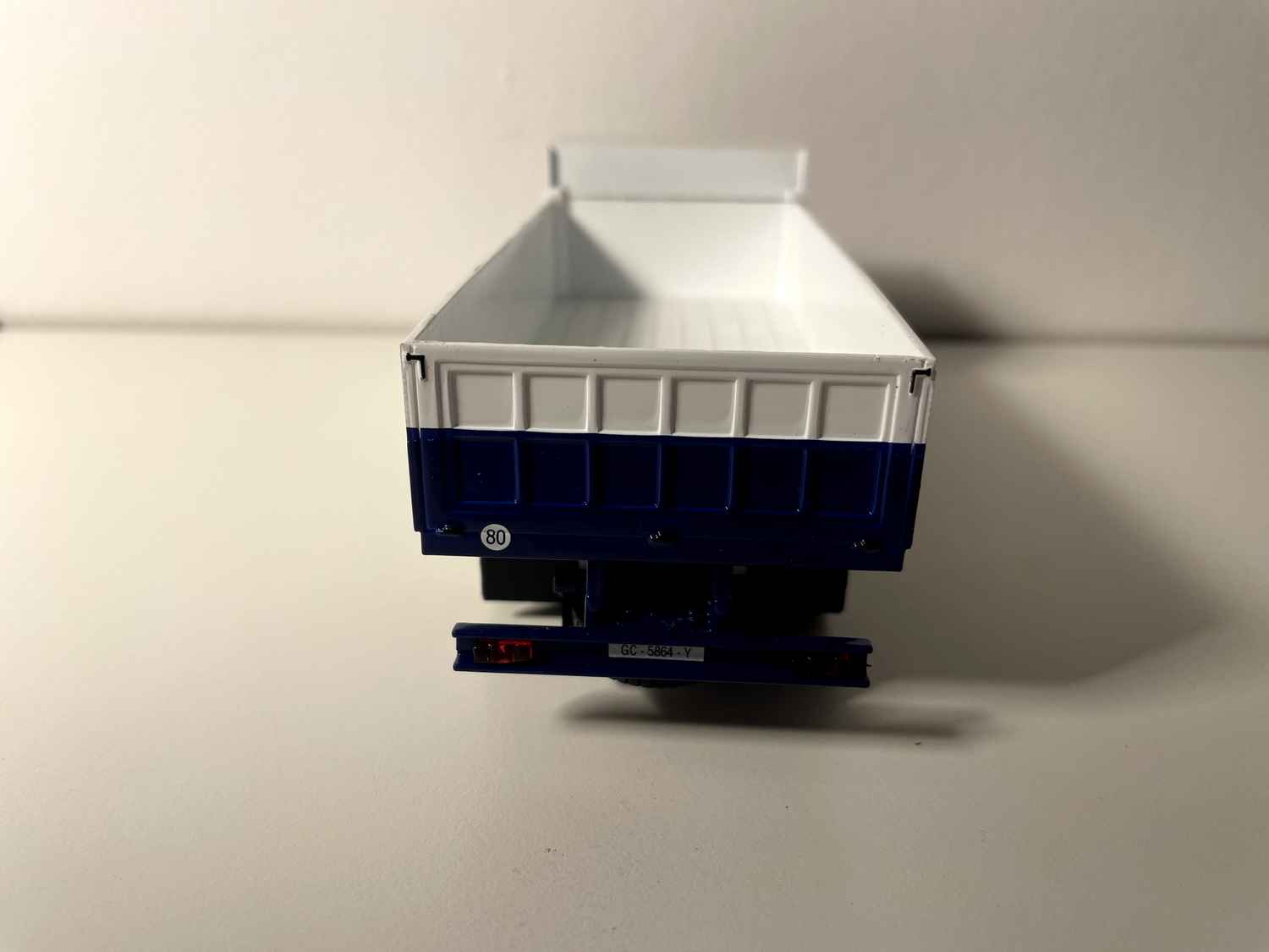 FIAT IVECO 619 truck with white cab and blue and white dump body