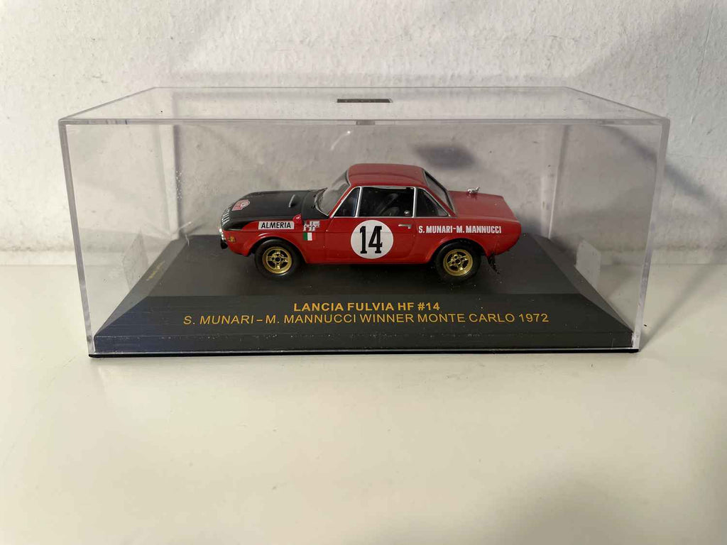 Czerwono-czarna Lancia Fulvia HF numer 14, zwyciężczyni Rajdu Monte Carlo w 1972 roku (kolekcja IXO)