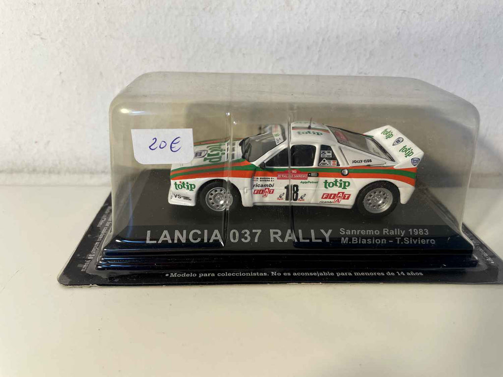 Weißer, orangefarbener und grüner Lancia 037 Rally Nummer 18 – Rallye San Remo 1983