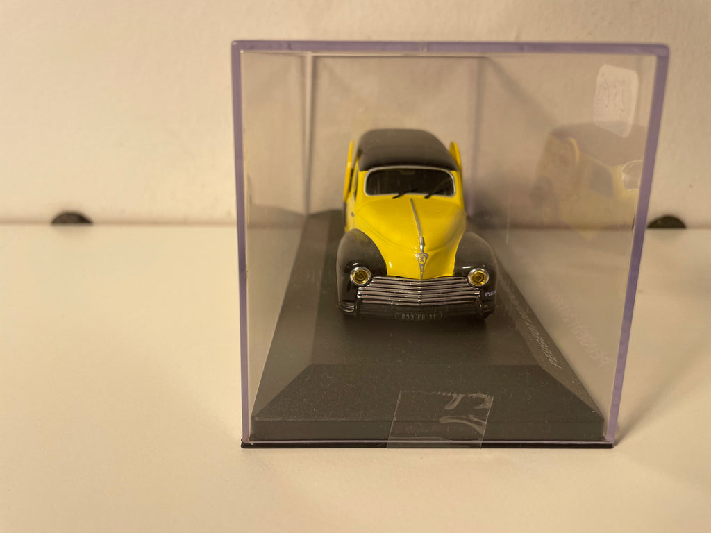 Peugeot 203 fourgonnette jaune et noire - Publicité "CACHOU LAJAUNIE"