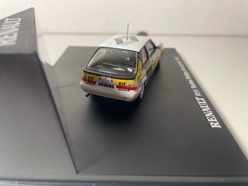 Renault 11 Turbo blanche, jaune et noire numéro 7 - rallye de l'Acropole de 1987 - IXO (coffret boite rectangle)