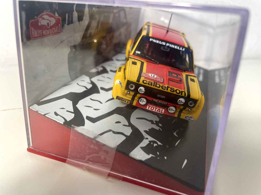 Fiat 131 Abarth żółty, czerwony i czarny numer 12 - Rajd Monte Carlo 1980