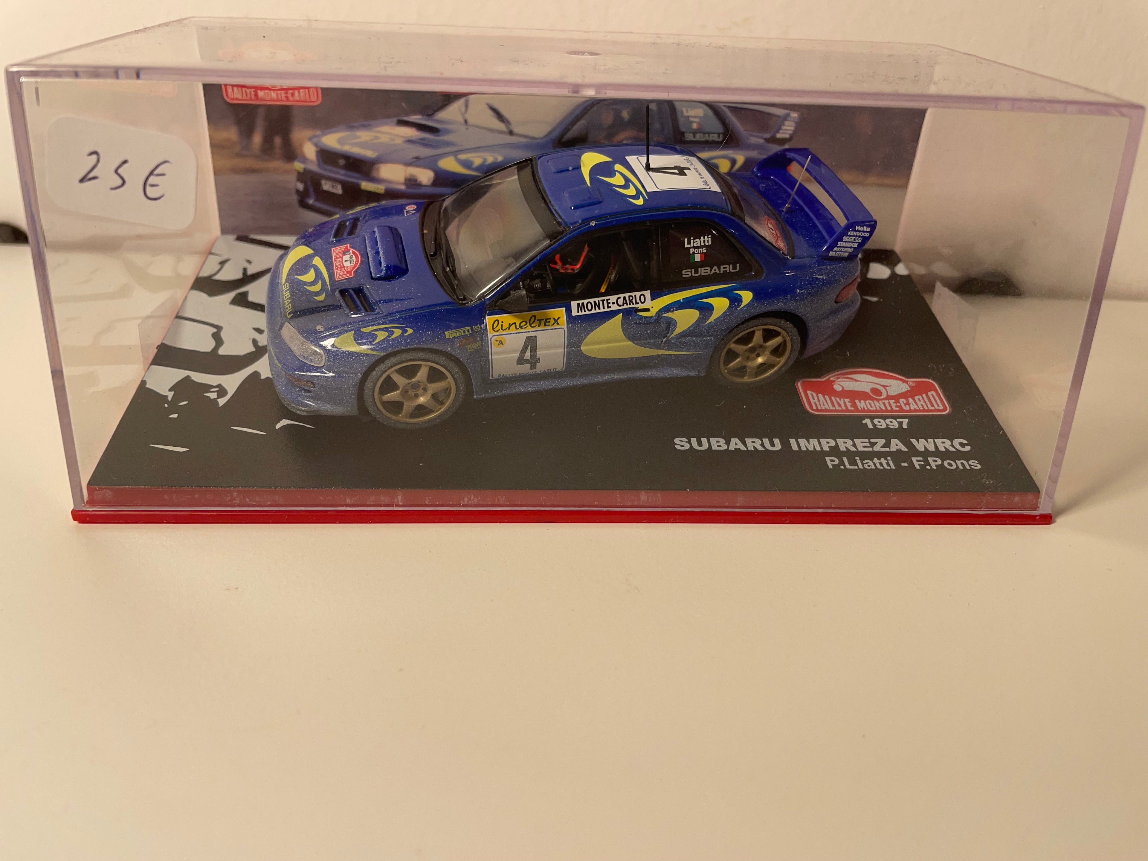 Subaru Impréza WRC niebiesko-żółta numer 4 - rajd Monte-Carlo 1997