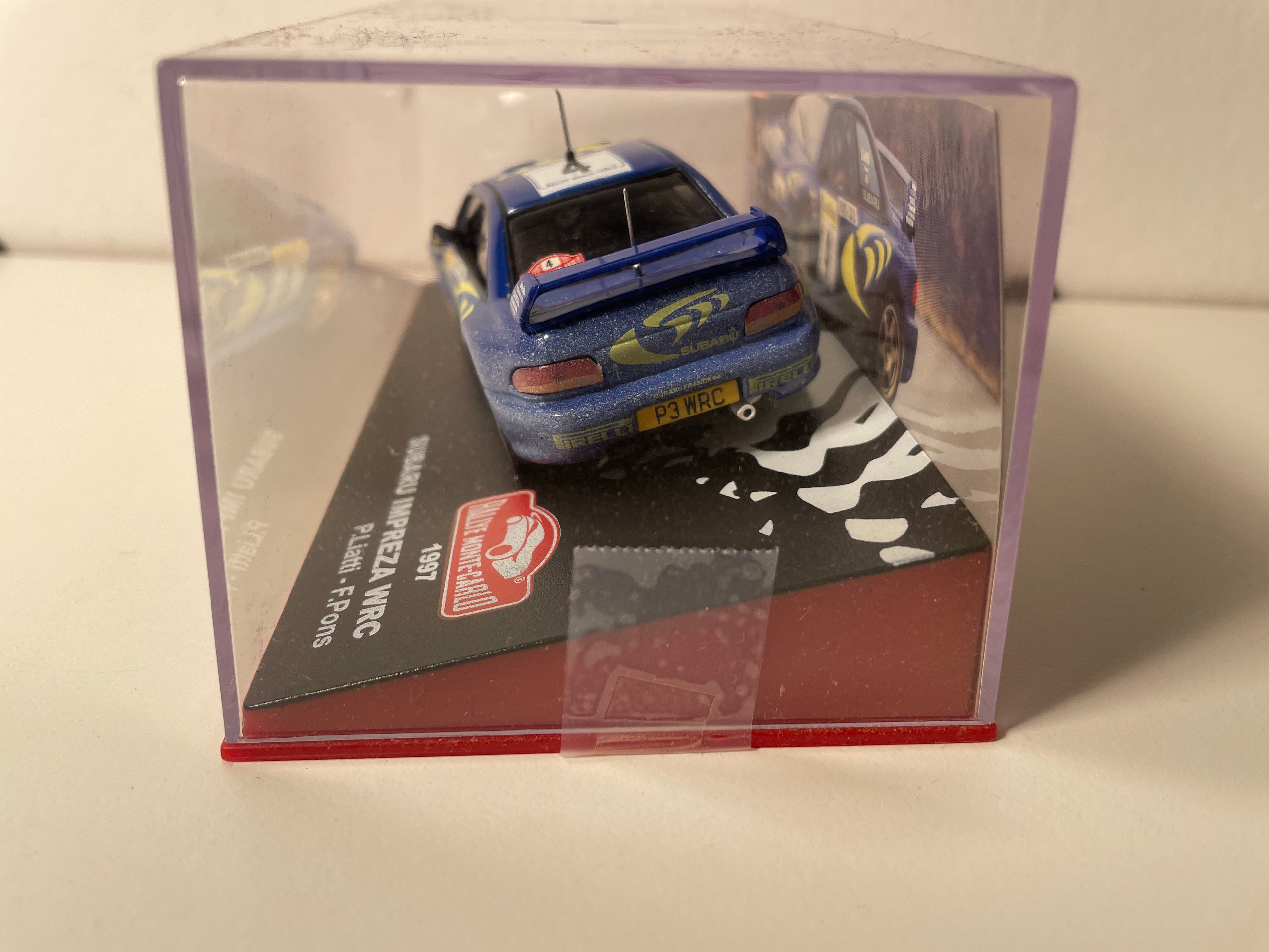 Subaru Impréza WRC niebiesko-żółta numer 4 - rajd Monte-Carlo 1997