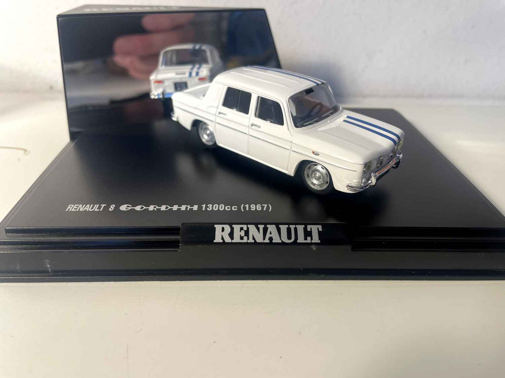 Renault 8 Gordini 1300 cc biała z niebieskimi paskami z 1967 roku (pudełko prostokątne) - NOREV