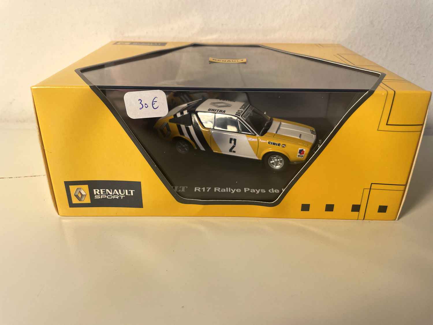 Renault 17 żółta i biała numer 2 rajd krajów wschodnich z 1977 roku (opakowanie prostokątne) - IXO