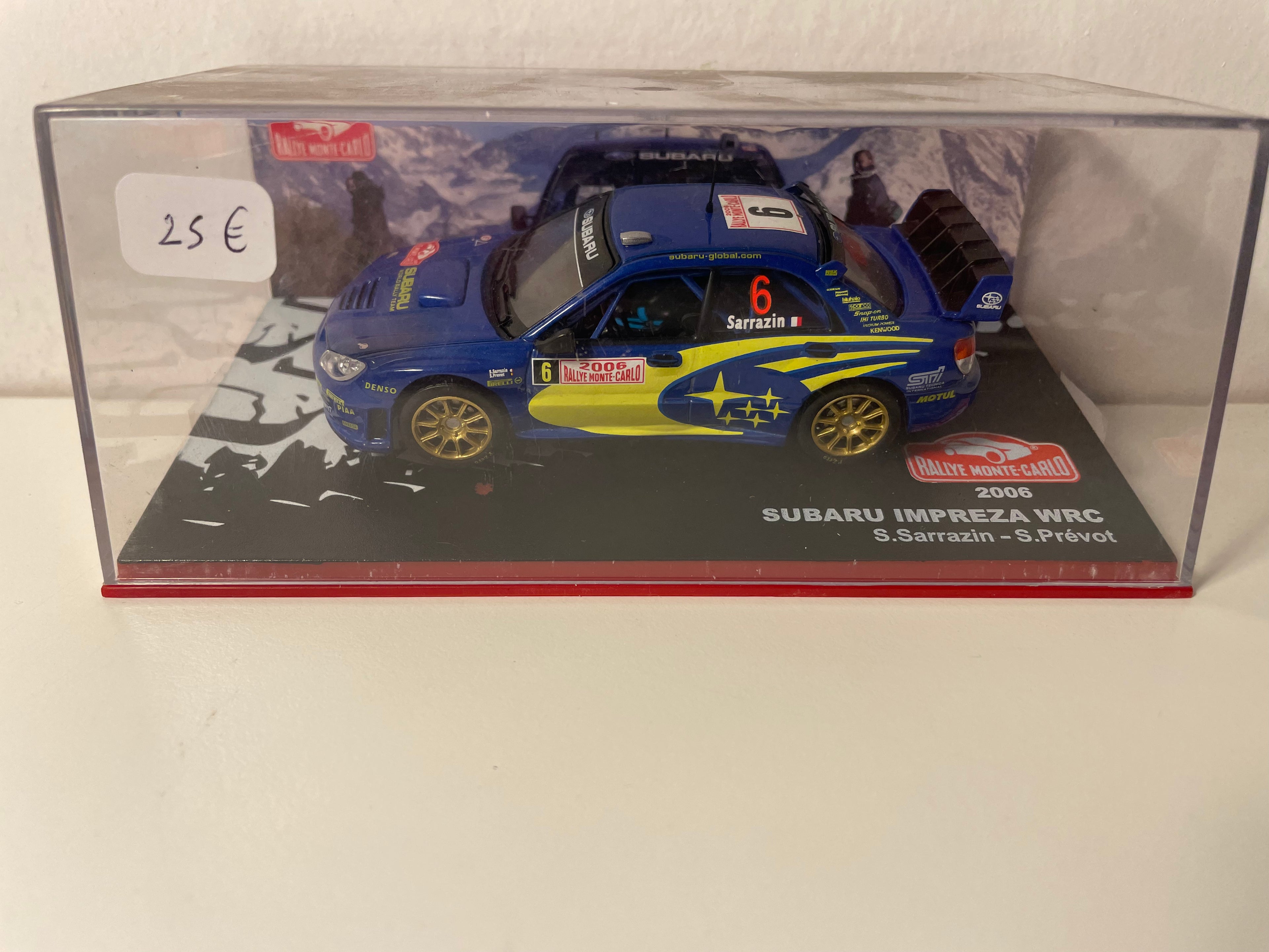 Subaru Impreza WRC niebieska i żółta numer 6 - Rajd Monako 2006