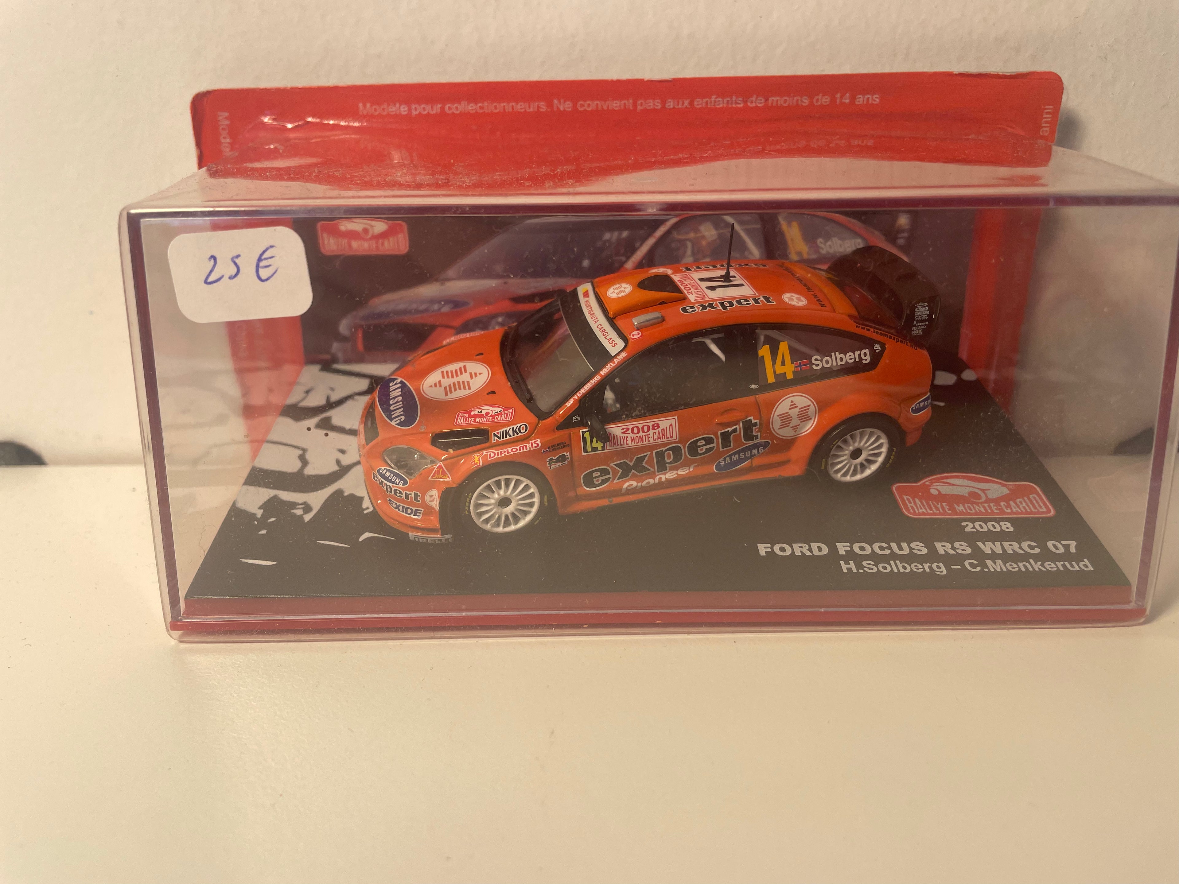 Ford Focus RS WRC 07 orange numéro 14 - rallye de Monté-Carlo de 2008