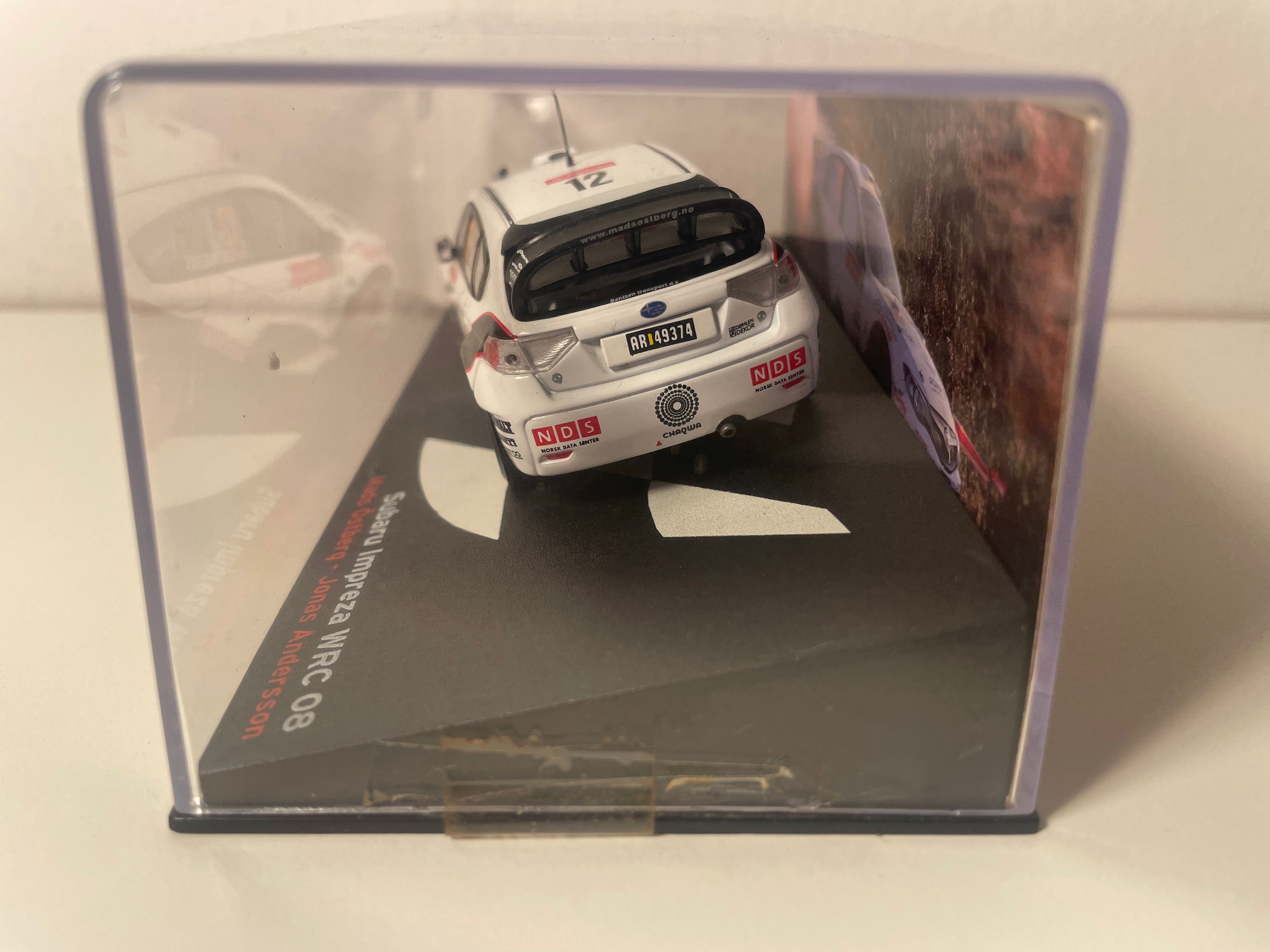Subaru Impreza WRC 08 biała i czarna numer 12 - rajd Portugalii 2010