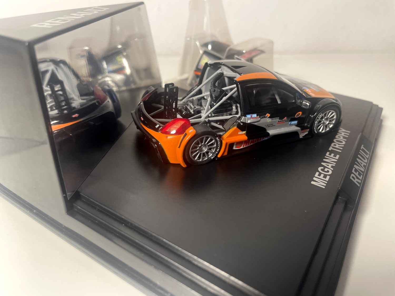 Mégane Trophy czarna, pomarańczowa i szara (coffret boite rectangle) - Boite N°1 - NOREV