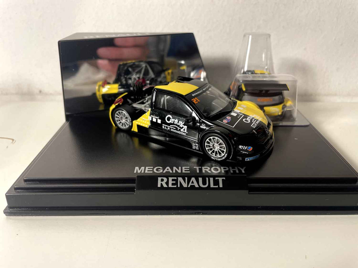 Mégane Trophy zwart en geel (rechthoekige doos) - Doos Nr. 4 - NOREV