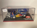 Skoda Fabia WRC bleue, jaune et grise numéro 11 - rallye de Monté-Carlo de 2006