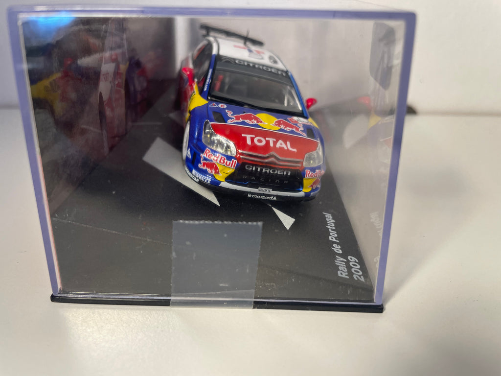 Citroën C4 WRC wit, blauw, rood en geel nummer 1 - Rally Portugal 2009