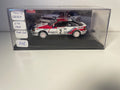 Toyota Célica GT4 blanche et rouge numéro 2 - rallye de Monté-Carlo de 1991 (voiture rajoutée sur un socle)
