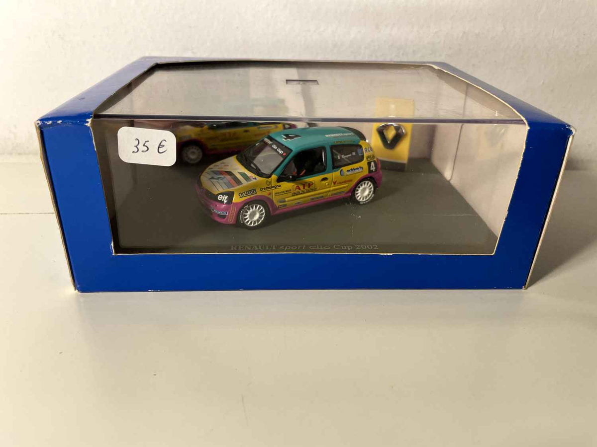 Renault Sport Clio Cup 2002 rosa, gelb und grün Nummer 4 von 2002 (rechteckiges Set) - Universal Hobbies